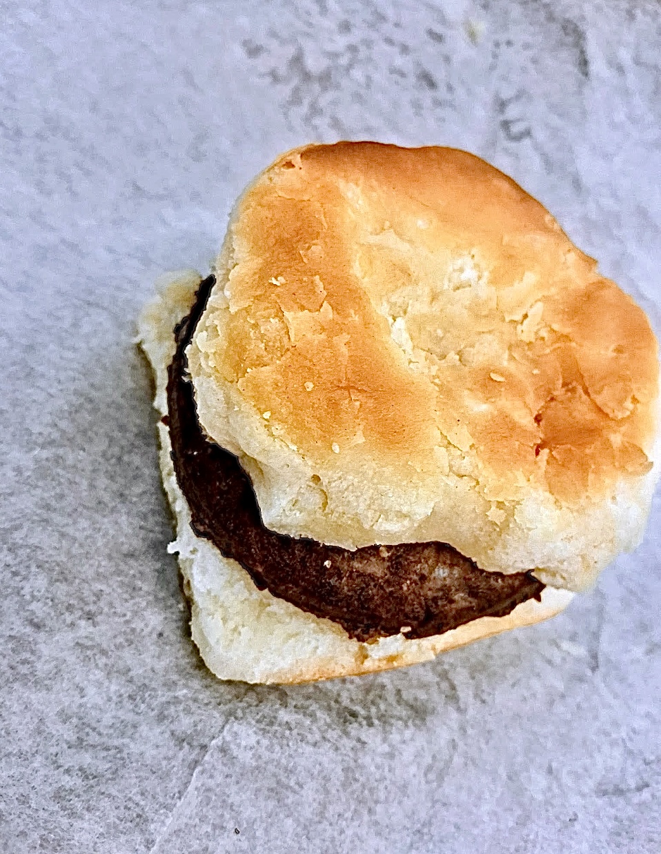 A breakfast sausage biscuit from JDM